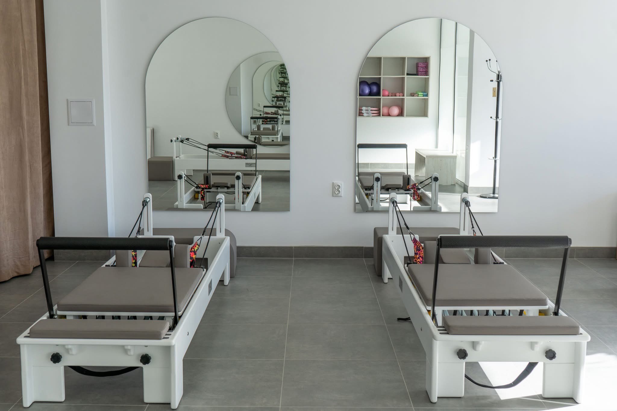 Person using a pilates reformer machine